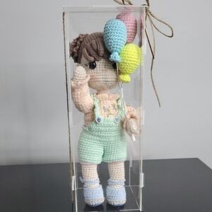 Crochet Doll with Balloons